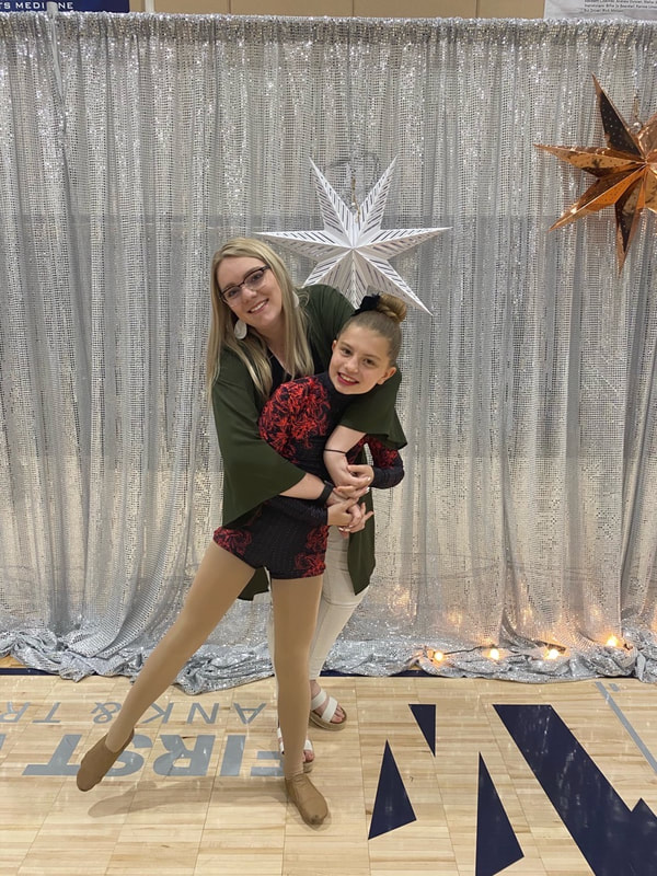 Kylie (cousin) and I at Spring Dance Show!
